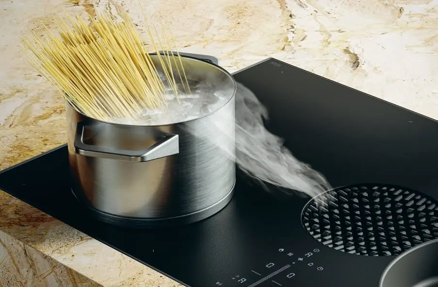 ob9asntcqzxotnsxjd3t BORA X Pure ploča za kuvanje sa integrisanim aspiratorom, pripremom testenine u loncu od nerđajućeg čelika, para se usisava kroz centralni otvor.